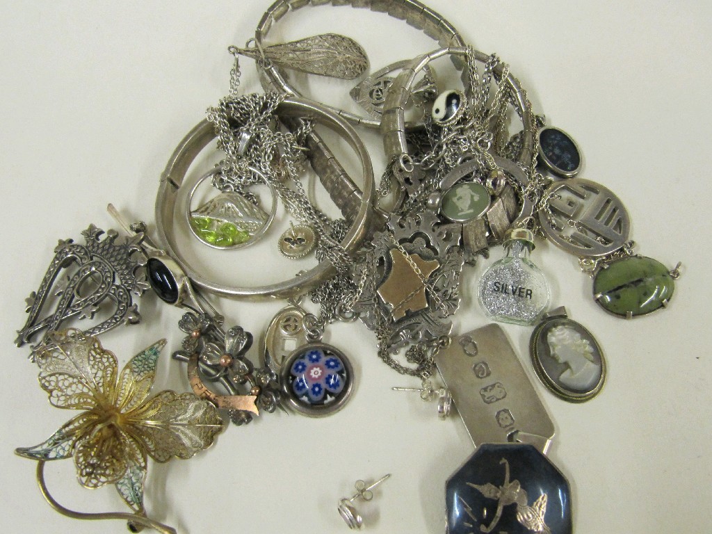 Appraisal: Lot of silver pieces to include bangles pendants brooches etc