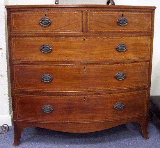 Appraisal: A th Century mahogany bowfront chest of four long and