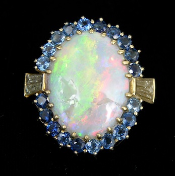 Appraisal: Australian Fire Opal Sapphire and Diamond Pendant A brilliant Australian