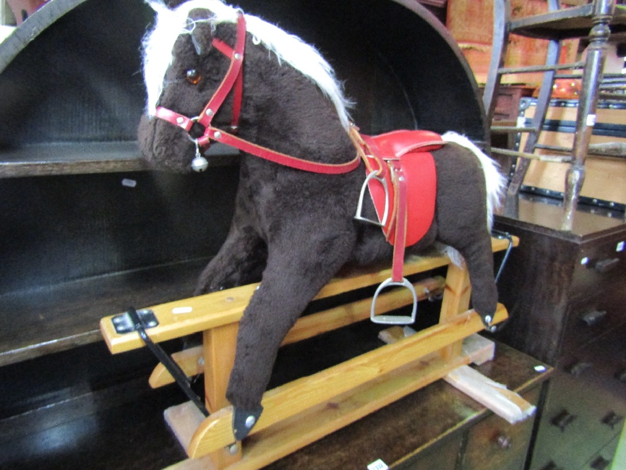 Appraisal: A contemporary child's soft toy rocking horse with stripped pine