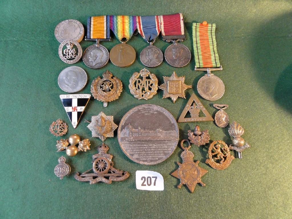 Appraisal: A small collection of various military badges together with a