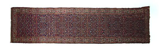 Appraisal: Ferahan Wool Runner with allover foliate decoration on a navy