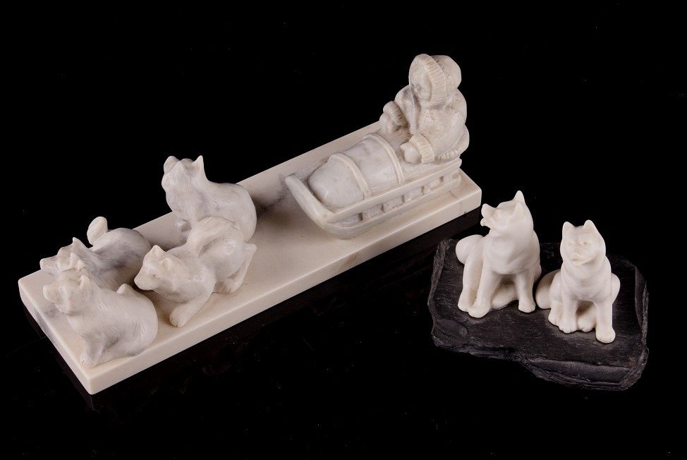 Appraisal: Eskimo Steatite Sled Dog Crew Pair of Sled Dogs For