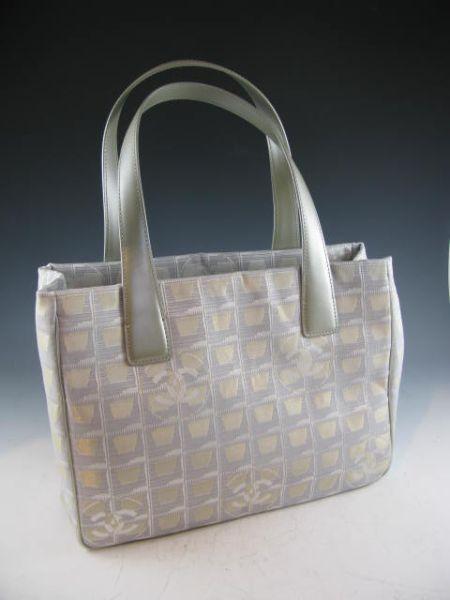 Appraisal: Chanel Tote gold and silver tone fabric with allover Chanel