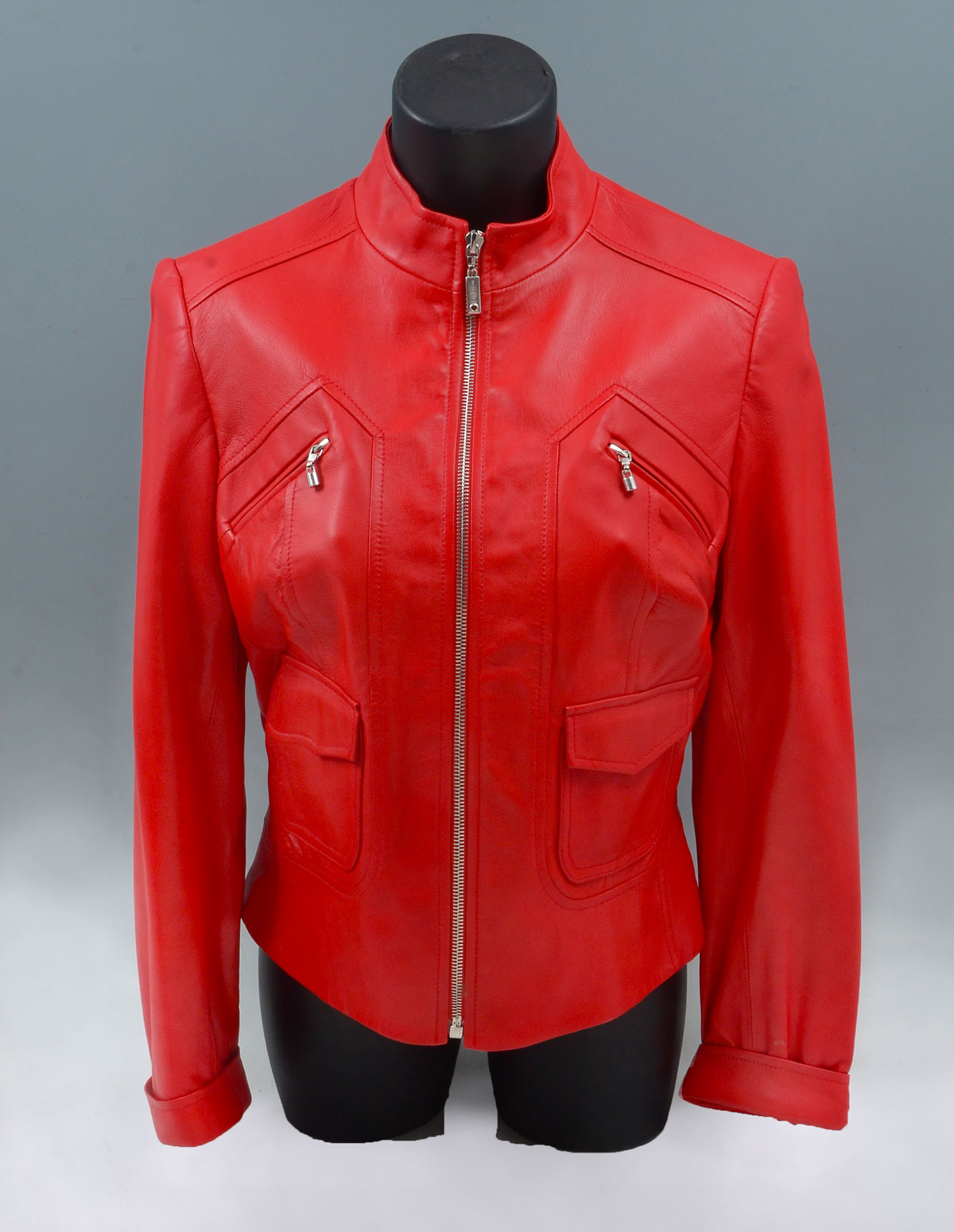 Appraisal: RED LAMB LEATHER JACKET BY ST JOHN This jacket looks