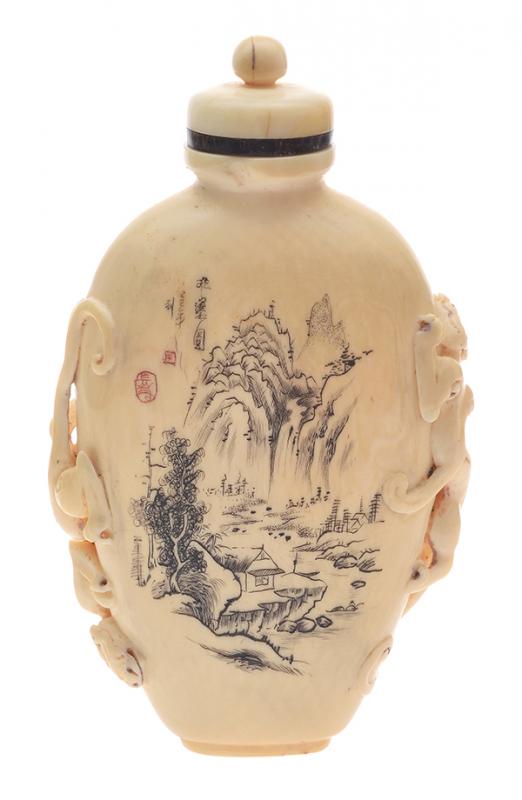 Appraisal: A CARVED AND PAINTED IVORY SNUFF BOTTLE