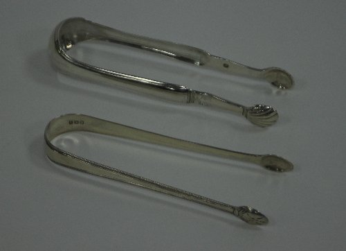 Appraisal: A pair of th Century cast silver sugar nips town