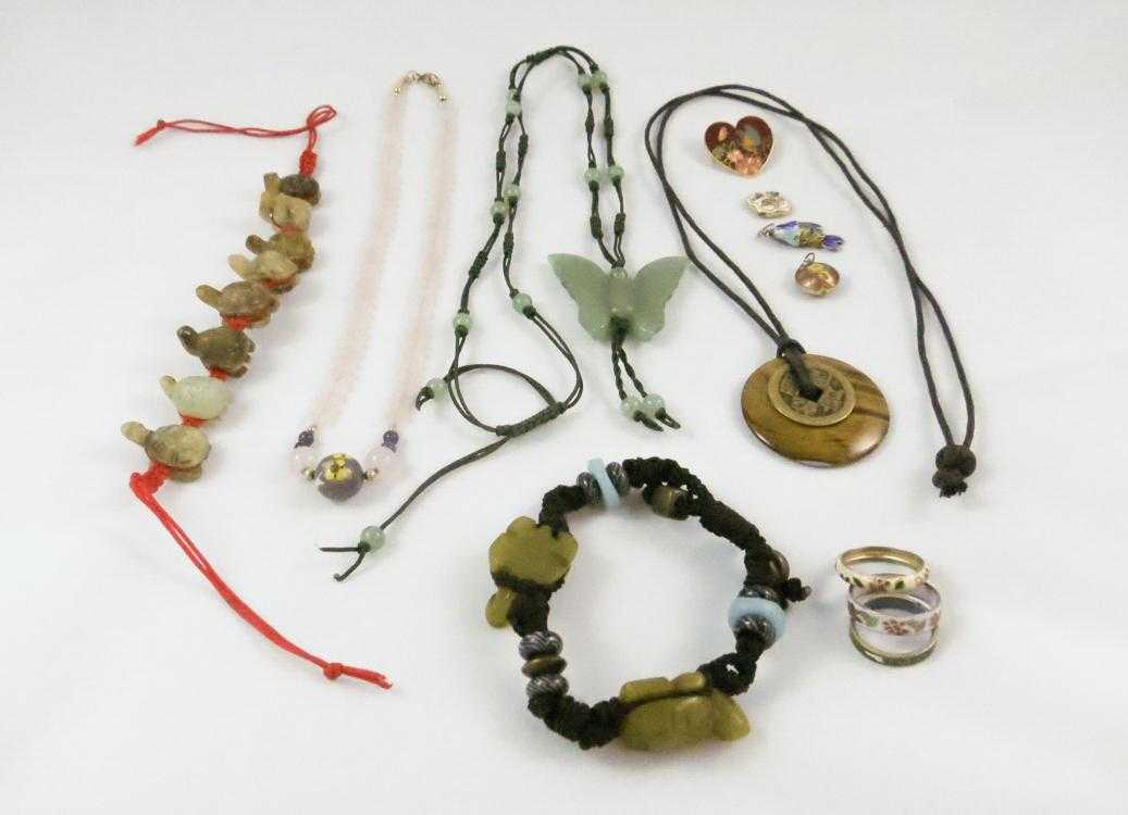 Appraisal: TWELVE ARTICLES OF CHINESE JEWELRY including a tiger's eye pendant