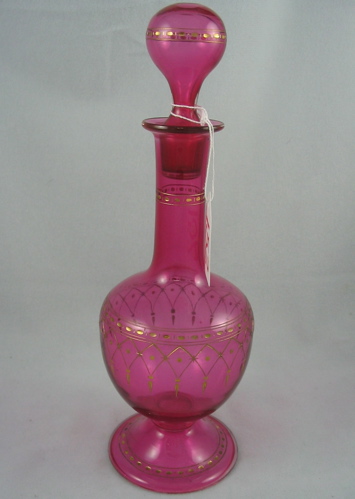 Appraisal: AN AMERICAN VICTORIAN CRANBERRY GLASS PERFUME BOTTLE having original stopper