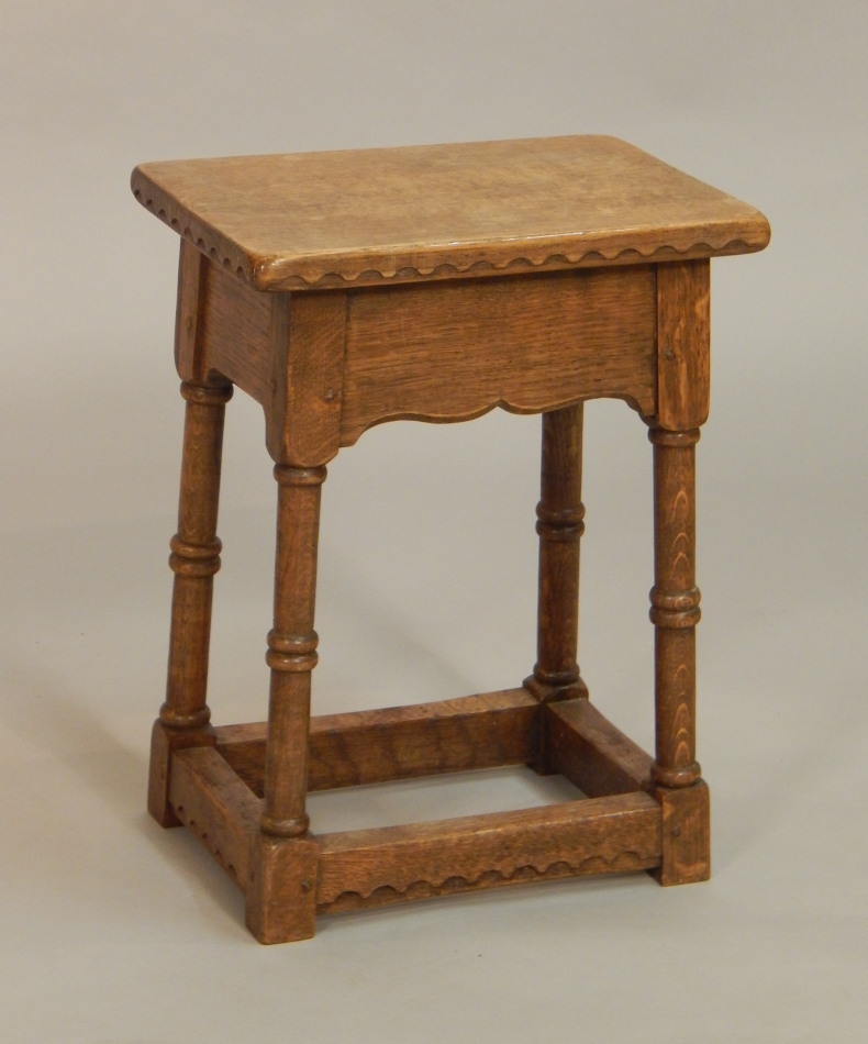 Appraisal: An oak joint stool the rectangular top with a carved