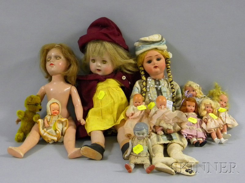 Appraisal: Eleven Dolls and a Small Mohair Articulated Bear including seven