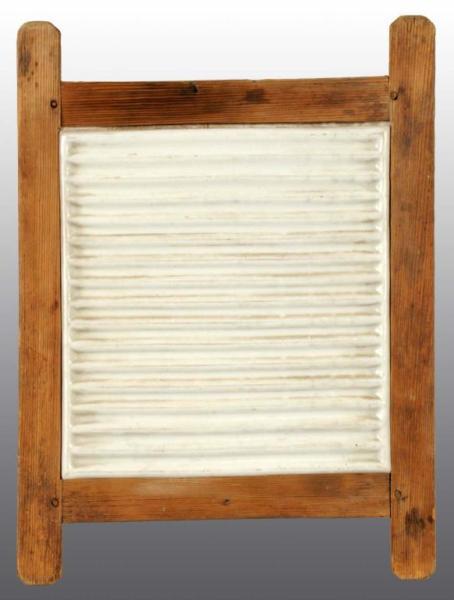 Appraisal: Pottery Washboard Description White pottery board with horizontal pattern Condition