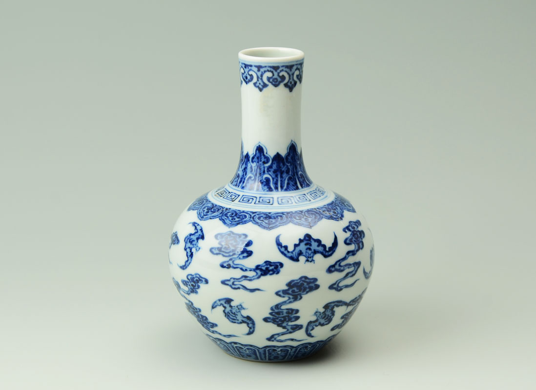 Appraisal: CHINESE BLUE WHITE BAT DECORATED BOTTLE VASE Cylindrical neck bulbous