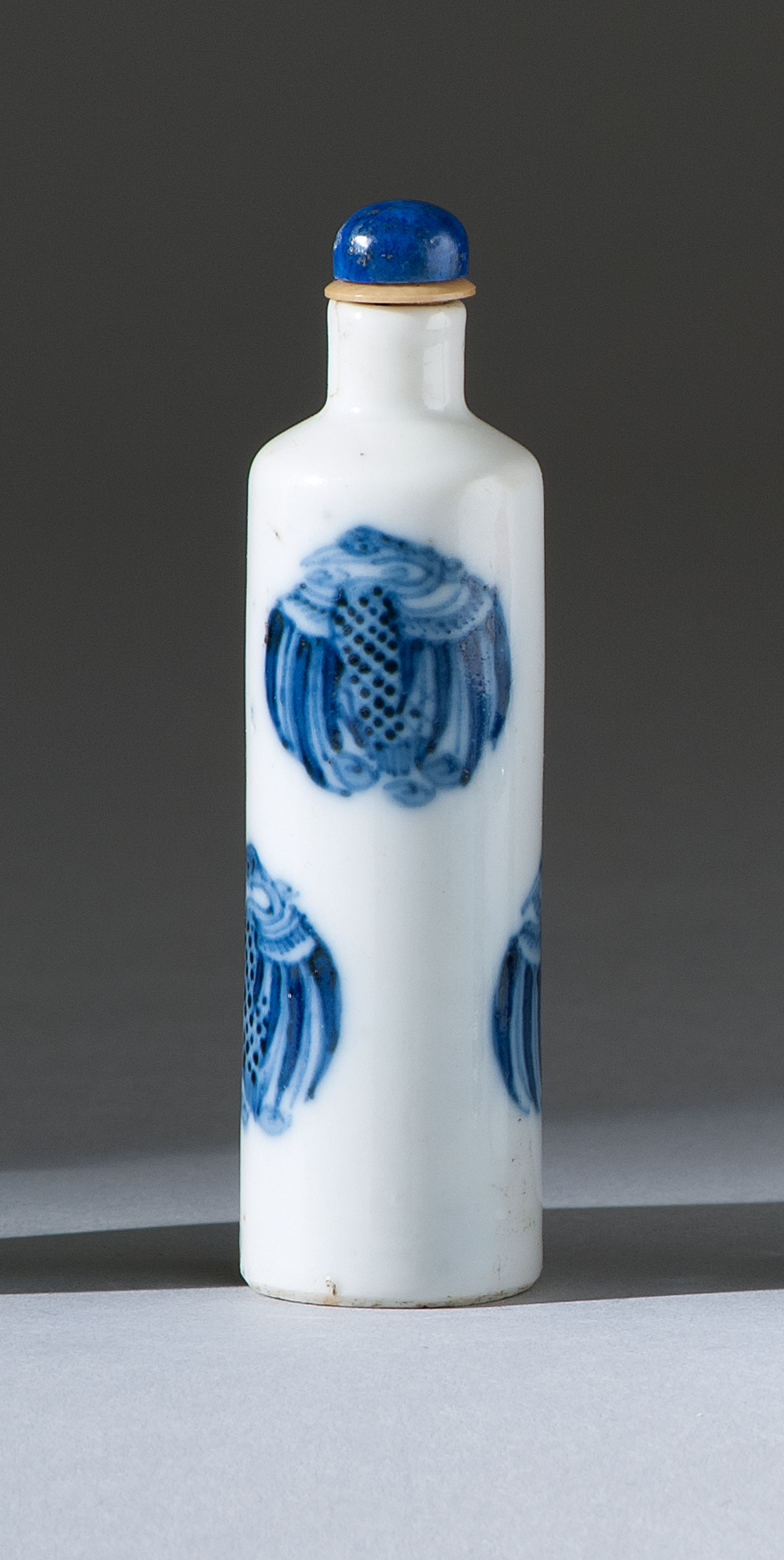 Appraisal: BLUE AND WHITE PORCELAIN SNUFF BOTTLE Early th CenturyIn cylinder