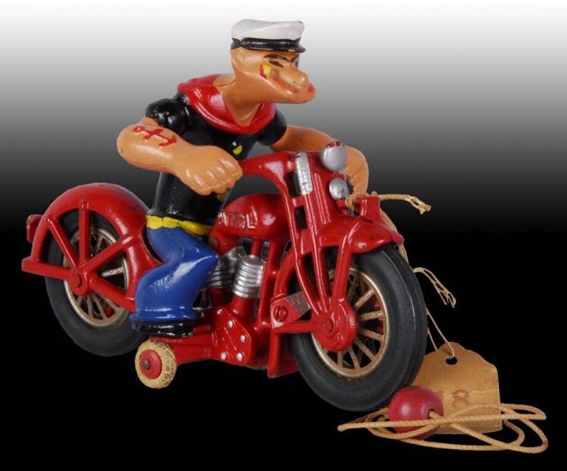 Appraisal: Cast Iron Hubley Popeye Motorcycle Toy Description Original clicker Black