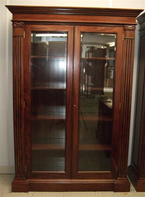 Appraisal: Pair of th century style mahogany bookcases with bevelled glazed