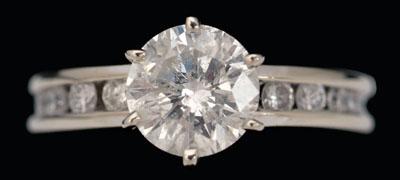 Appraisal: Diamond engagement ring central round brilliant-cut diamond estimated weight cts