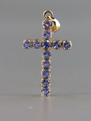 Appraisal: Sapphire Cross round purpleish blue gems totaling carats in k