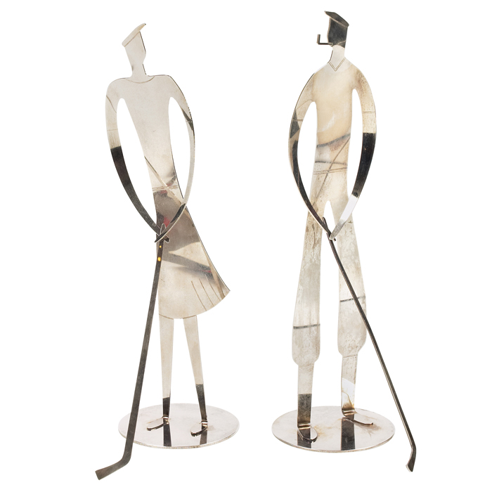 Appraisal: Franz Hagenauer golfer sculptures twoAustria polished metal male and female