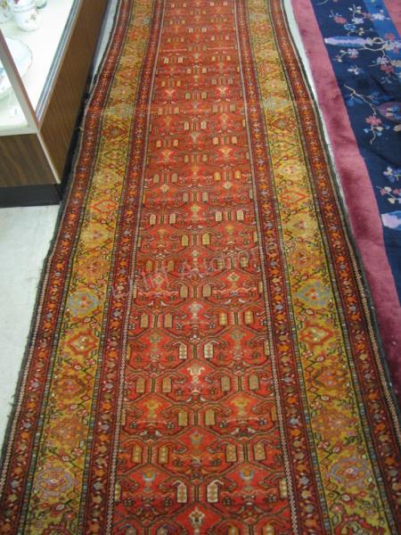 Appraisal: A semi-antique Oriental runner ' x ' Afghan tribal design