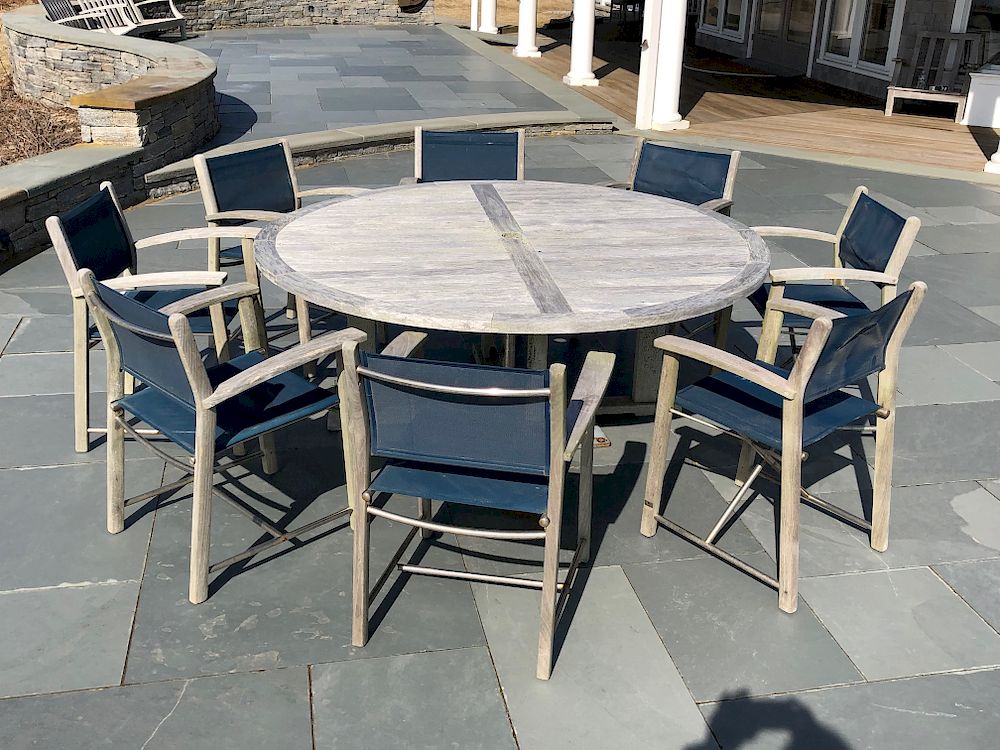 Appraisal: Round Teak Dining Table and Assembled Chairs with Blue Woven