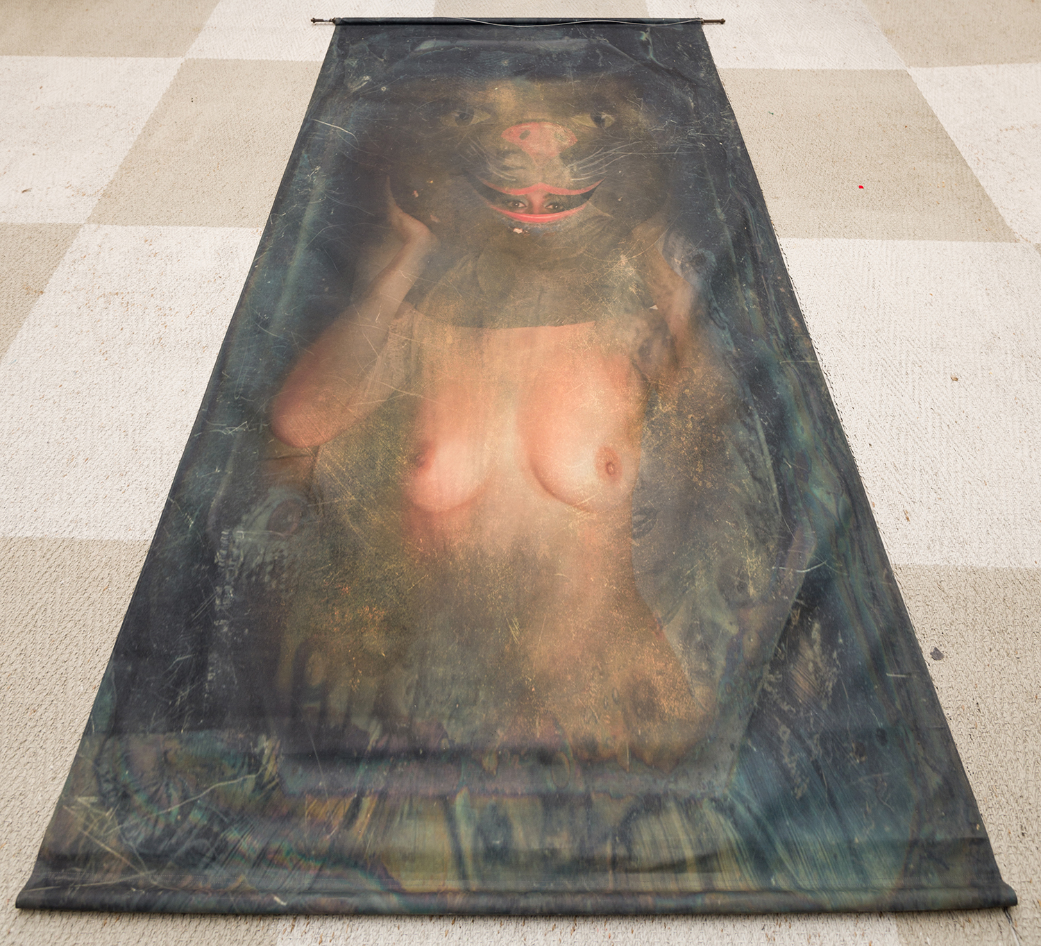 Appraisal: A PHOTOCRAPHIC SCROLL WITH BRONZE FINIALS DEPICTING A FEMALE NUDE