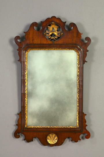 Appraisal: Regency-Style Carved Sawn and Parcel-Gilt Walnut Looking Glass third quarter