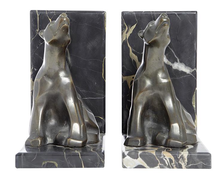 Appraisal: A PAIR OF ART DECO BRONZE POLAR BEAR BOOKENDS modelled