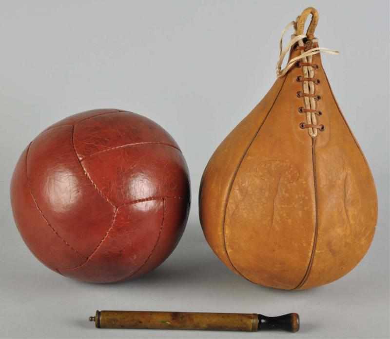 Appraisal: Lot of Early Sports Equipment Description Includes medicine ball punching