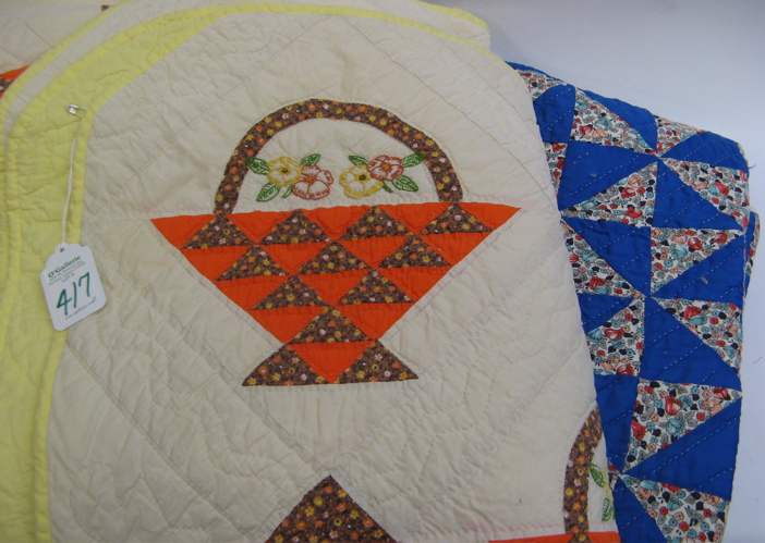 Appraisal: TWO AMERICAN HANDMADE PATCHWORK QUILTS One is a pieced appliqu