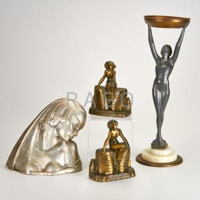 Appraisal: ART DECO Four pieces Kronheim and Oldenbush spelter figural bookends