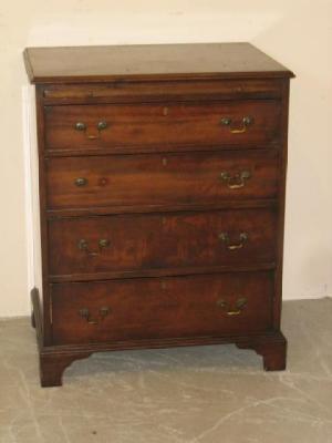 Appraisal: A MAHOGANY CHEST the moulded edged top with slide over