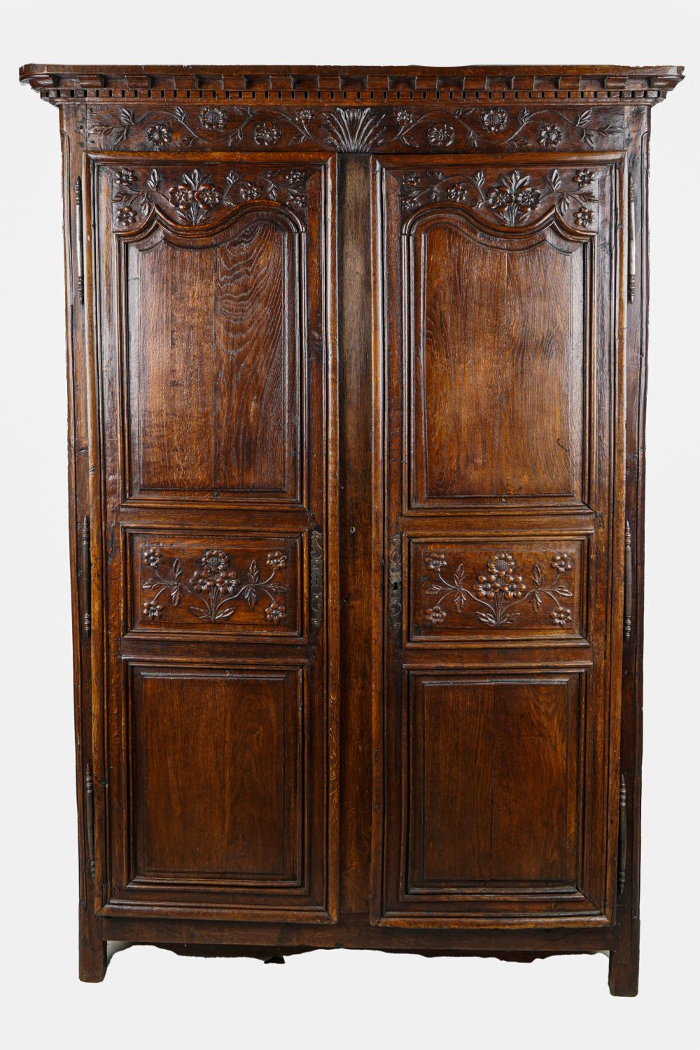 Appraisal: FRENCH PROVINCIALCARVED OAK ARMOIRElate th early th century the dentil-carved