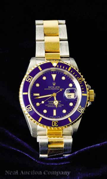 Appraisal: A Rolex Stainless Steel and kt Yellow Gold Man's Submariner