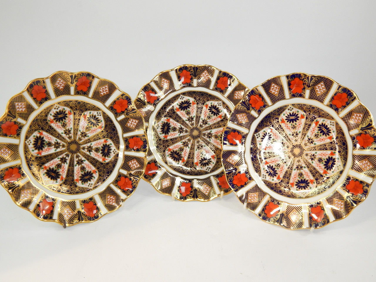 Appraisal: A set of five Royal Crown Derby porcelain dessert plates