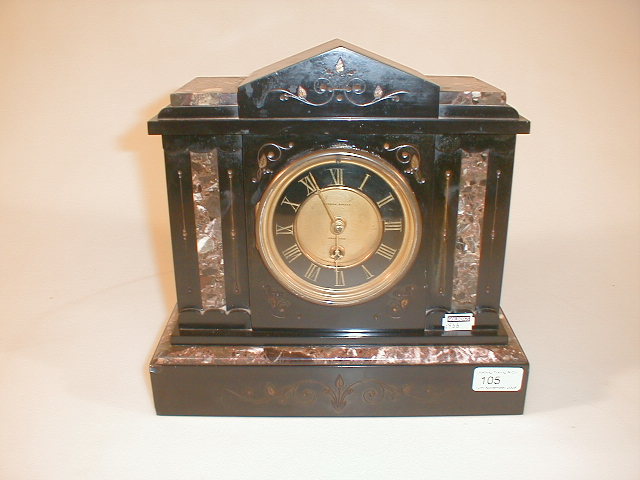 Appraisal: A thC polished slate and marble mantle clock of architectural