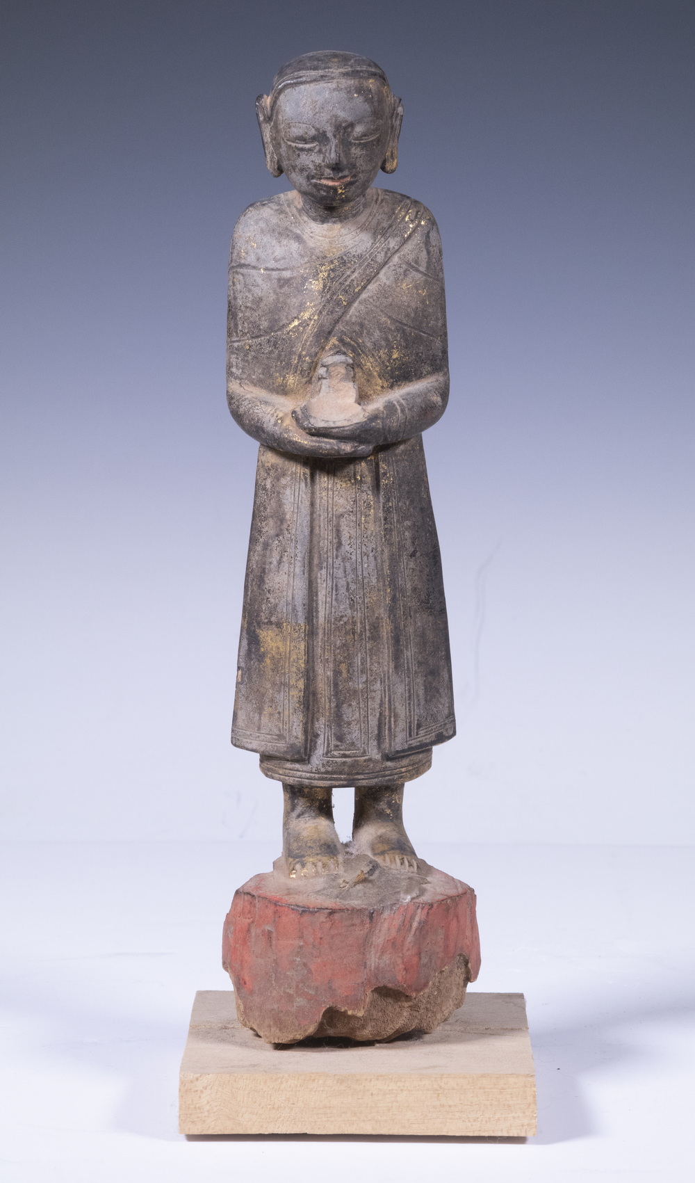 Appraisal: TH C LAO STANDING GILT WOOD FIGURE WITH REMNANTS OF