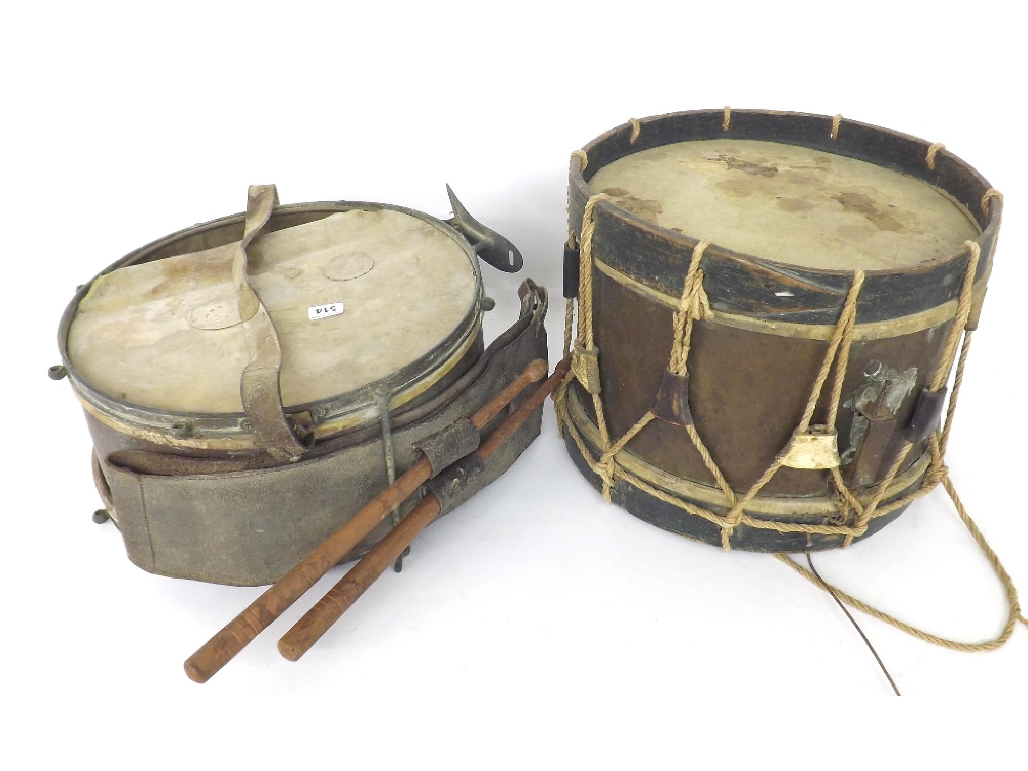 Appraisal: Two old marching drums both in need of attention one