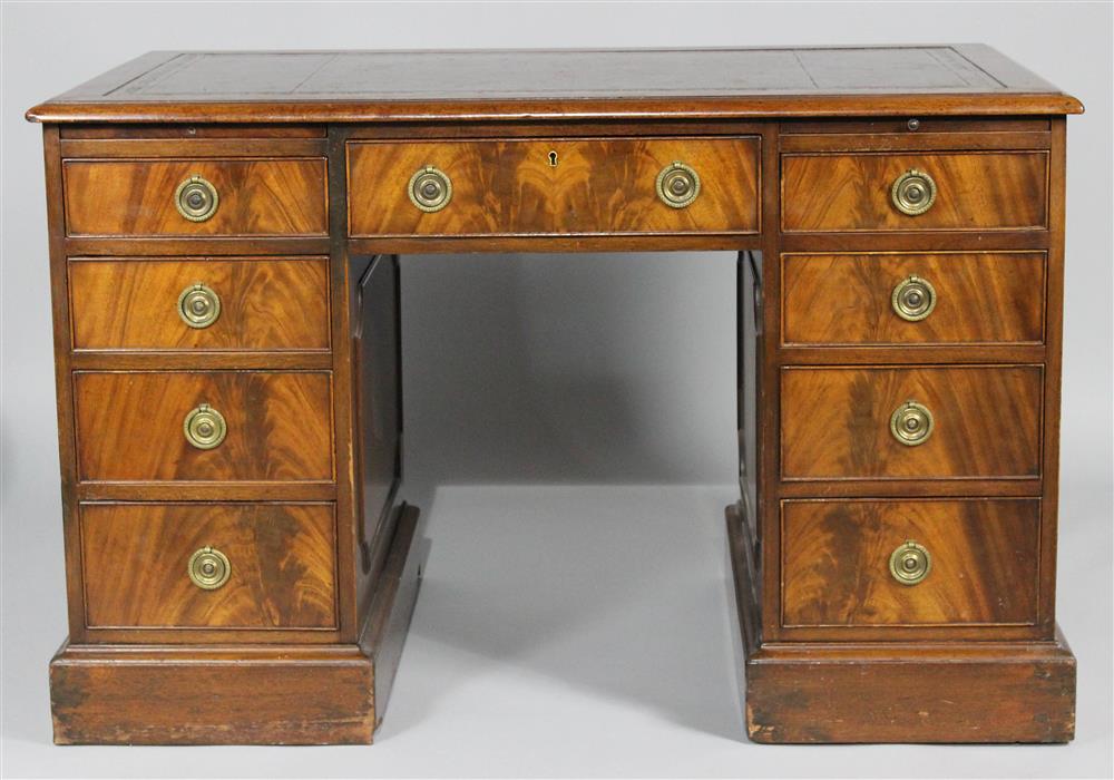 Appraisal: GEORGIAN STYLE MAHOGANY PEDESTAL DESK the rectangular top with brown