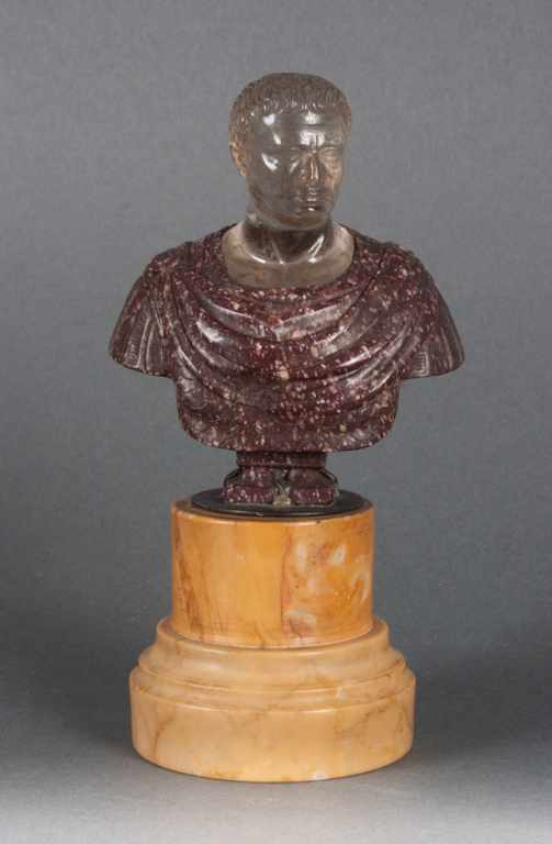 Appraisal: Continental porphyry marble and rock crystal bust of Caesar on