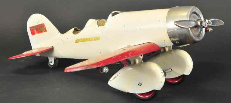 Appraisal: STEELCRAFT ''LOCKHEED SIRIUS'' WITH LIGHTS pressed steel ivory fuselage and