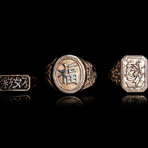 Appraisal: Three Chinese Silver Rings two chased with characters one with