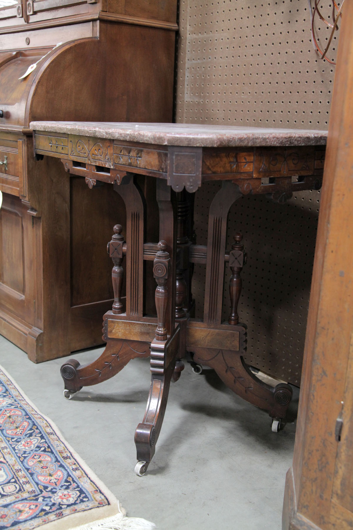 Appraisal: VICTORIAN PARLOR TABLE American late th century Mottled brown and