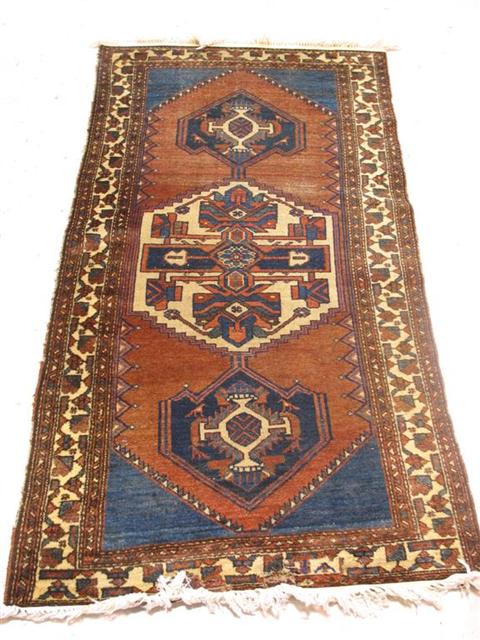 Appraisal: ANTIQUE HAMEDAN RUG Blues and yellows on red ground -