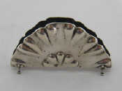 Appraisal: An Austro Hungarian assay silver napkin holder shaped as a