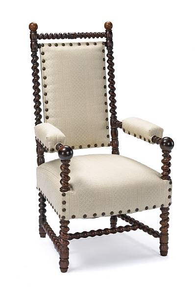 Appraisal: A Spanish Baroque style rosewood upholstered armchair The spiral carved