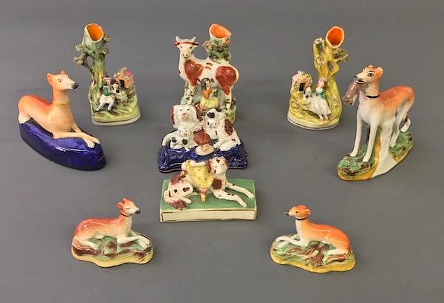 Appraisal: Nine Staffordshire Figures Spill Vases Whippets Nine Staffordshire figures including