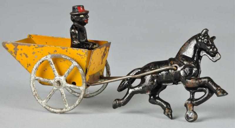 Appraisal: Cast Iron Tin Horse-Drawn Cart Description American African American driver