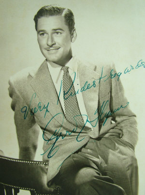 Appraisal: Errol Flynn a publicity photograph autographed in blue ink unframed