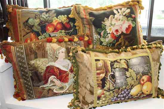 Appraisal: Four Needlepoint and Silk Pillows comprising two with fruit still